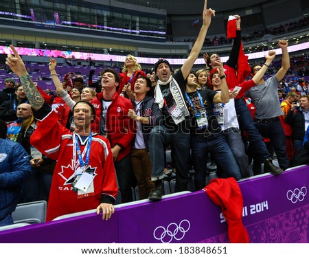 Sochi, RUSSIA - February 20, 2014: Fans of Canadian Women\'s Ice hockey team celebrates their team victory in Gold Medal Game vs. USA team at the Sochi 2014 Olympic Games
