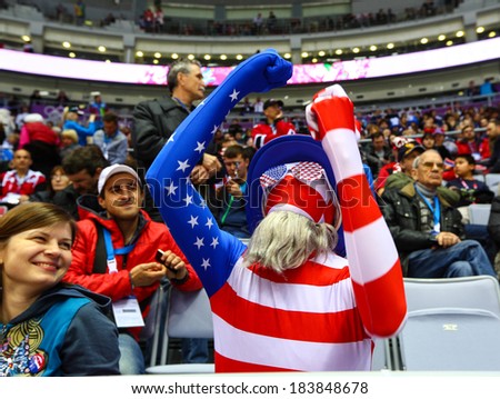 Sochi, RUSSIA - February 20, 2014: Fan of USA Women\'s Ice hockey team at Gold Medal Game vs. Canada team at the Sochi 2014 Olympic Games