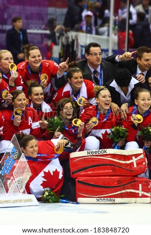 Sochi, RUSSIA - February 20, 2014: Canadian Women\'s Ice hockey team gold medalists, at medal ceremony after Gold Medal Game vs. USA team at the Sochi 2014 Olympic Games