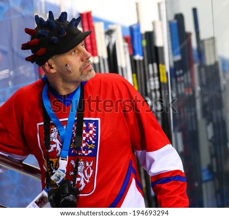 Sochi, RUSSIA - February 18, 2014: Czech team fans on tribunes during Ice hockey Men\'s Play-offs Qualifications Game vs. Slovakia team at the Sochi 2014 Olympic Games