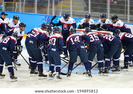 Sochi, RUSSIA - February 18, 2014: Slovakia team players on ice at start of Ice hockey Men\'s Play-offs Qualifications Game vs. Czech team at the Sochi 2014 Olympic Games