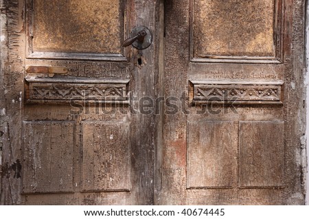 old wooden doors with aged paint texture