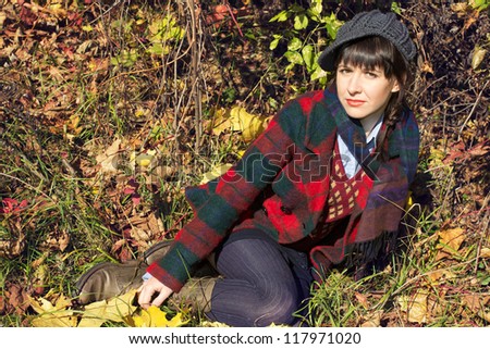 Girl in vintage clothes in autumn colors