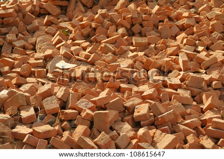 Conceptual image of red bricks pile