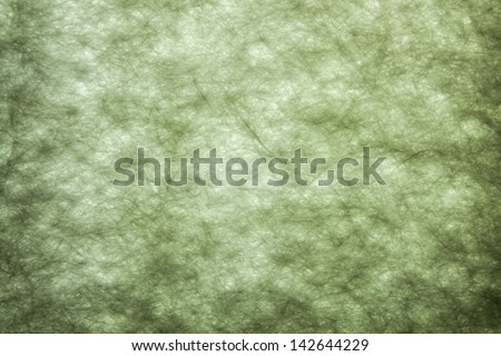 Abstract background of synthetic fibers in glass wall