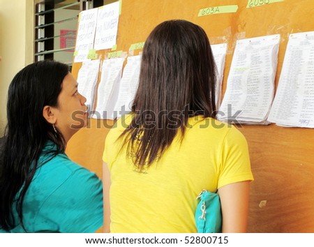 CAVITE, PHILIPPINES - MAY 10: Voters exercise their rights for the Presidential Election on May 10, 2010 in the Philippines. First time that the Commission on Election will implement full automation.