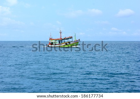 Rayong beach, Thailand: April 6, 2014 - Passenger boat in the middle of the sea