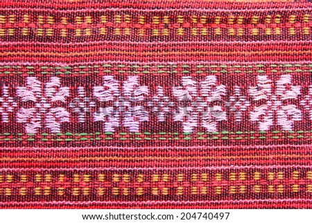 Pattern background of batik sarong in Thailand, traditional fabric in Asia