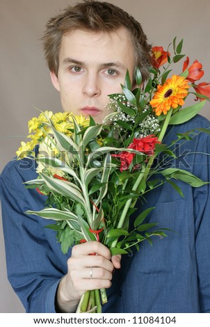 Young man bouquet flowers