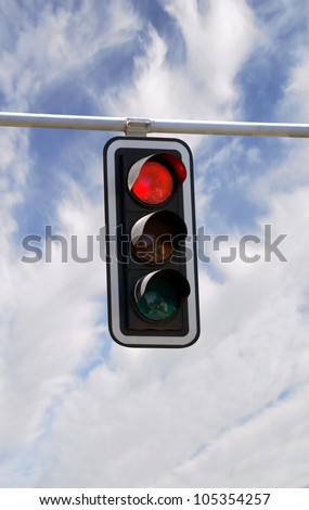 Red traffic lights against blue sky backgrounds with clipping path