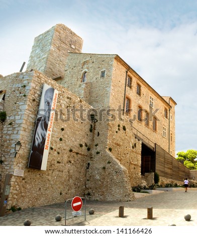ANTBES, FRANCE - MAY 6: Grimaldi Castle on May 6, 2013 in Antibes, France. Grimaldi Castle now is the Picasso Museum, where are exposed paintings and ceramics of Pablo Picasso.