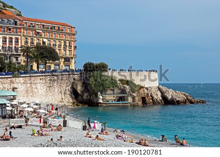 NICE, FRANCE - MAY 4: Beach Angel bay on May 4, 2013 in Nice, France. Citizens and tourists sunbathing enjoying a sunny day on the beach.