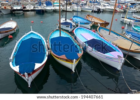 NICE, FRANCE - APRIL 27: Colorful boats within a Port de Nice on April 27, 2013 in Nice, France. Port de Nice was started in 1745.