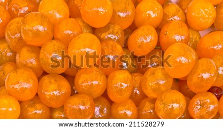 Orange candy made like fruit. Market in city of Nice, France.