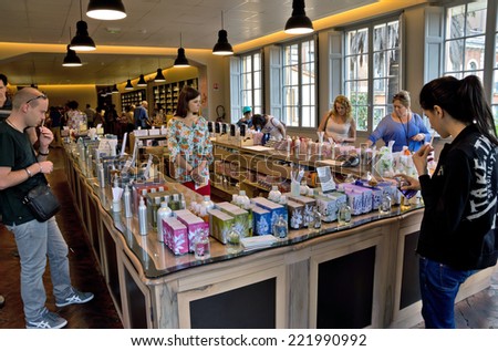 GRASSE, FRANCE - JUNE 2, 2014: Perfume Shop inside Fragonard factory. People choose and buy perfume. Fragonard perfumery is one of the older factory in the world capital of perfumes.