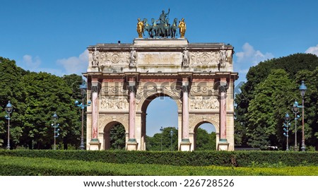Triumphal Arch (Arc de Triomphe du Carrousel) at Tuileries gardens in Paris, France. Monument was built between 1806-1808 to commemorate Napoleon\'s military victories.