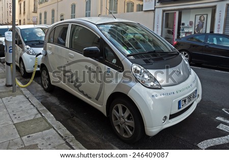 NICE, FRANCE - JUNE 2, 2014: Electric cars charging on a street in the city of Nice.