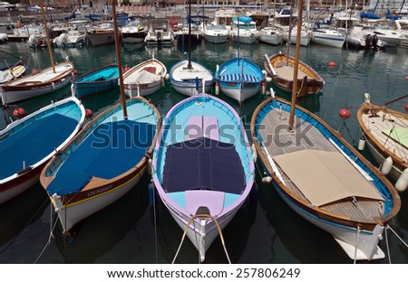 NICE, FRANCE - MAY 31: Colorful boats within a Port de Nice on May 31, 2014 in Nice, France. Port de Nice was started in 1745.