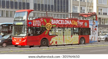 BARCELONA, SPAIN - JULY 8, 2015: Tourist bus in Barcelona, Spain. Barcelona City Tour is a new official touristic bus service that shows the city with an audio guide.