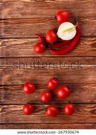 collage Fresh red tomato ,chilli,and onion in table wooden background