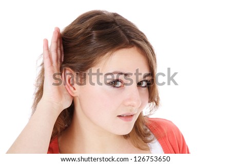 Attractive teenage girl cant hear you. All on white background.