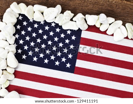 Flag of the United States of America on wooden background.