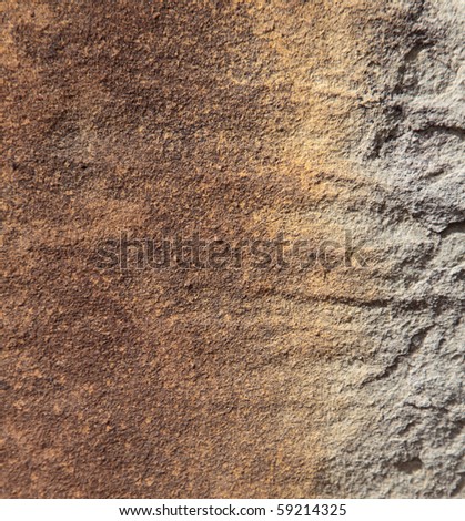 Fine stone background texture with a brown to grey gradient.