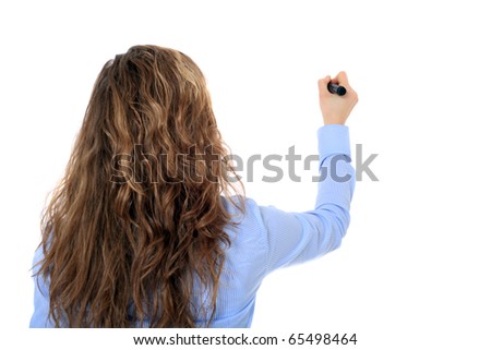 Back view of an attractive young girl using a marker. All on white background.