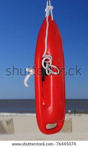 Red life buoy at the beach