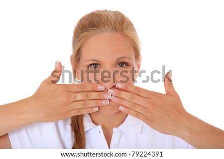 Attractive woman keeps her mouth shut. All on white background.