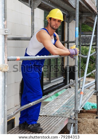 Manual worker on construction site.