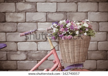 Flower bucket on the bike with vintage idea