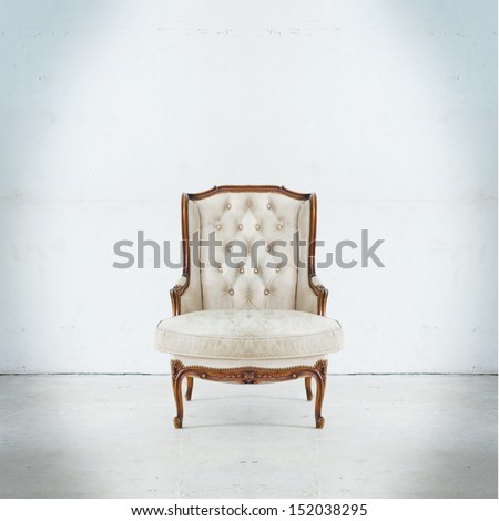 Luxurious armchair in white room