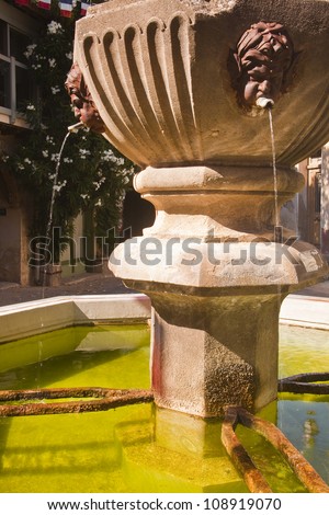 A small fountain in the village of Venasque in Provence.