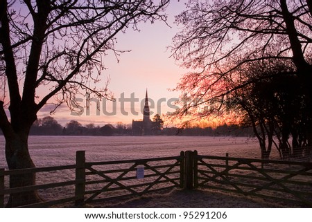 Low mist and pastel colours help to bring in the day over Salisbury.