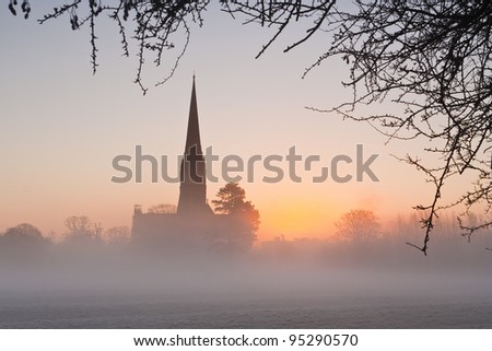 The breaking dawn in front of Salisbury cathedral.
