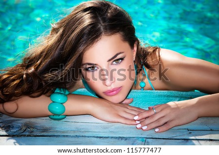 Portrait Of A Beautiful Woman Posing By The Pool, Summer Day, Outdoor