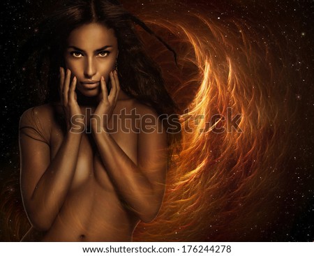 artistic portrait of a beautiful young woman on fire background