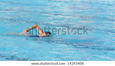 The sportsman - swimmer on training on navigation in pool