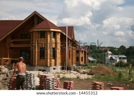 Construction of wooden modern residential buildings is carried out