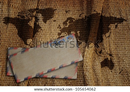 Old envelope on the old world map.