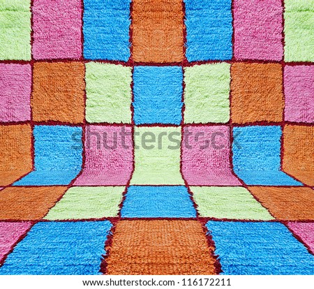 Multi-colored squares carpet background. Carpet room.