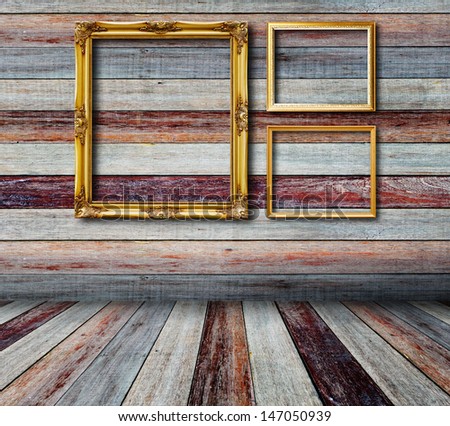 Picture frame on wall in vintage wood room.