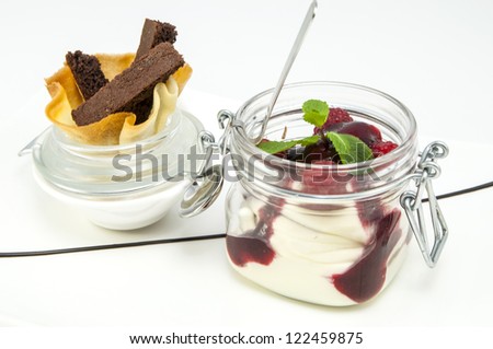 raspberry cream dessert in a glass jar