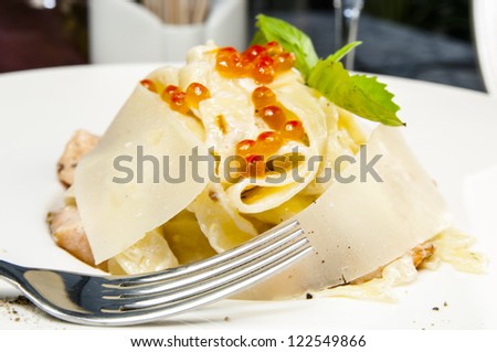 macaroni and cheese and salmon caviar