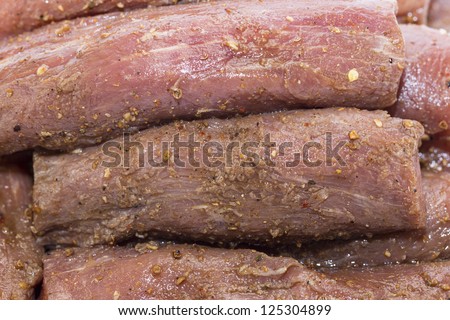 raw meat and spices for cooking on the grill