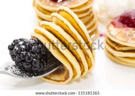 sweet little pancakes with blackberry jam