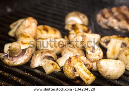 Cooking mushrooms on grill