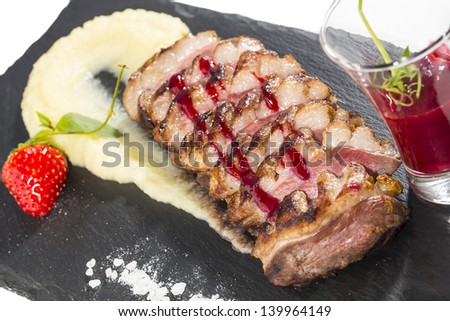 baked goose breast with mashed potatoes and apple sauce