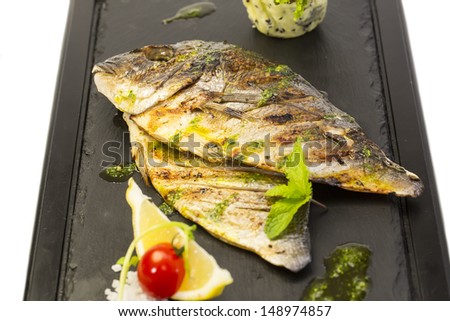 sea fish cooked on the grill